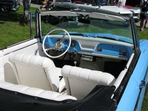 looking into 1962 Studebaker Lark Daytona convertible with white interior and bright blue paint