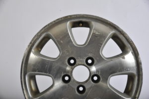 scuffed hubcap